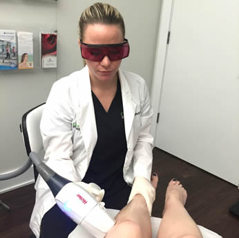 Holly Performing Laser Hair Removal